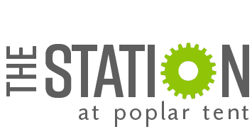 a green star wars logo on a green background